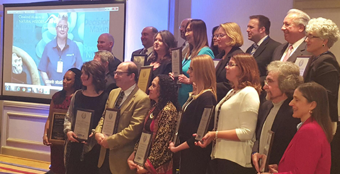 Distance Learning Coordinator Lee Gambol (pictured on screen) accepted the Museum’s Innovation Award via digital conference